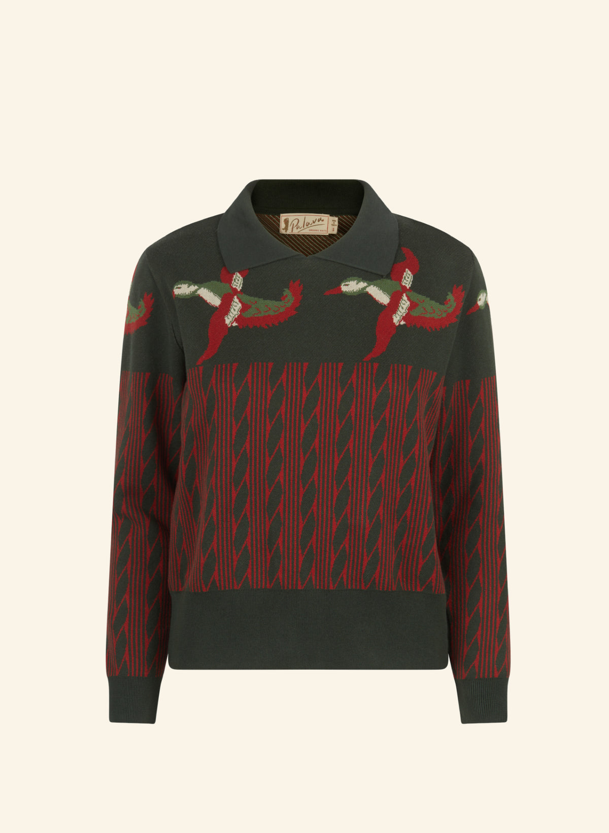A knit polo sweater in dark green with red and green striped patterns on the lower body and red-and-white flying duck motifs across the shoulders, shown on a light cream background.