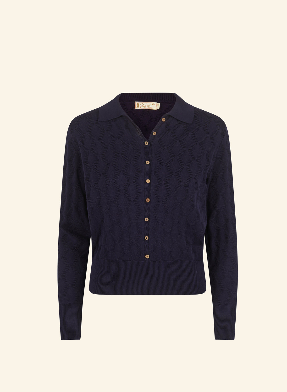 A dark navy blue knit polo cardigan made from 100% organic cotton with a textured pattern and gold buttons, displayed on a clean cream-colored background.