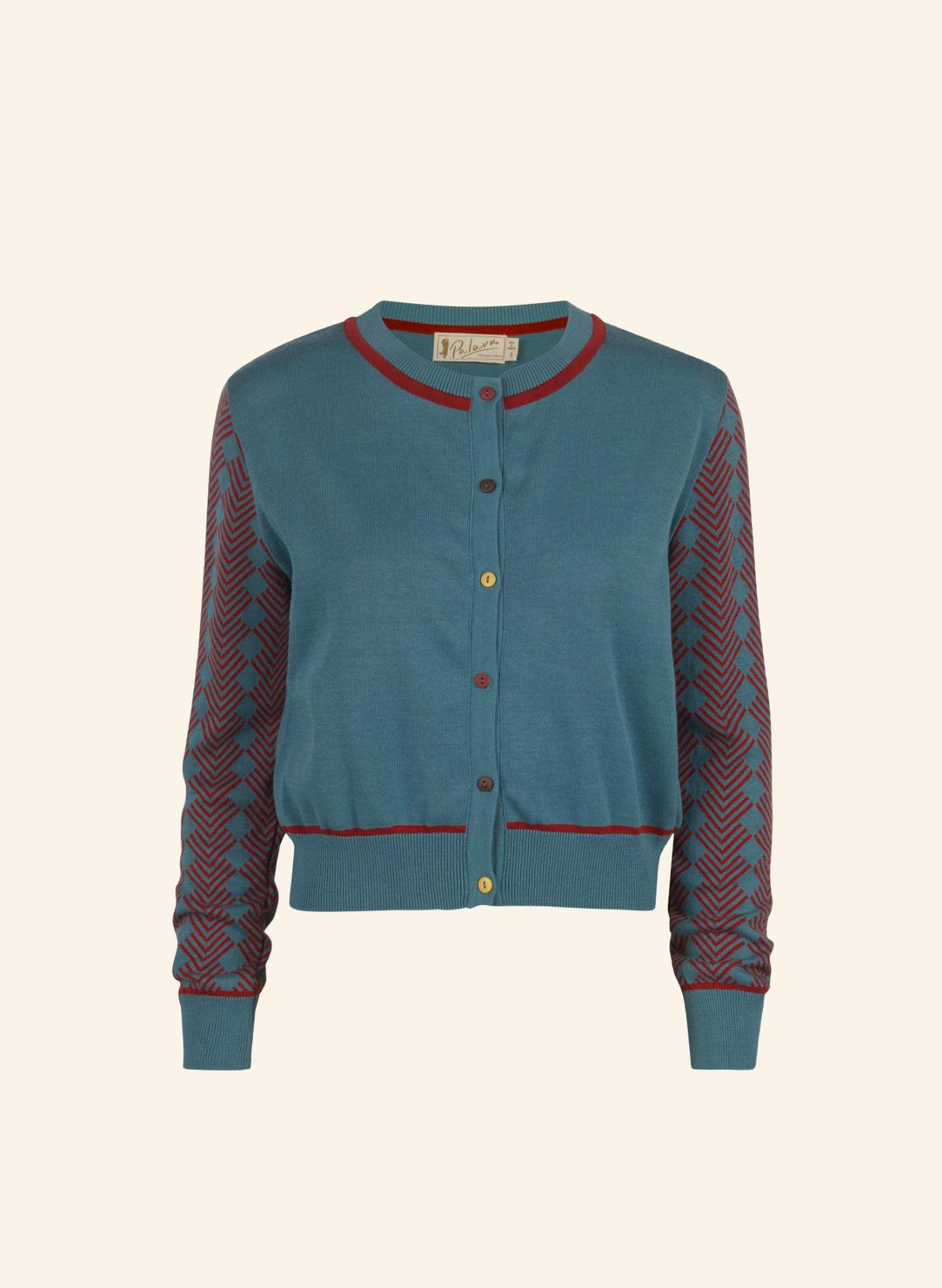 A teal blue knit cardigan sweater with red and blue chevron patterned sleeves, red trim, and gold buttons, shown against a solid cream background.