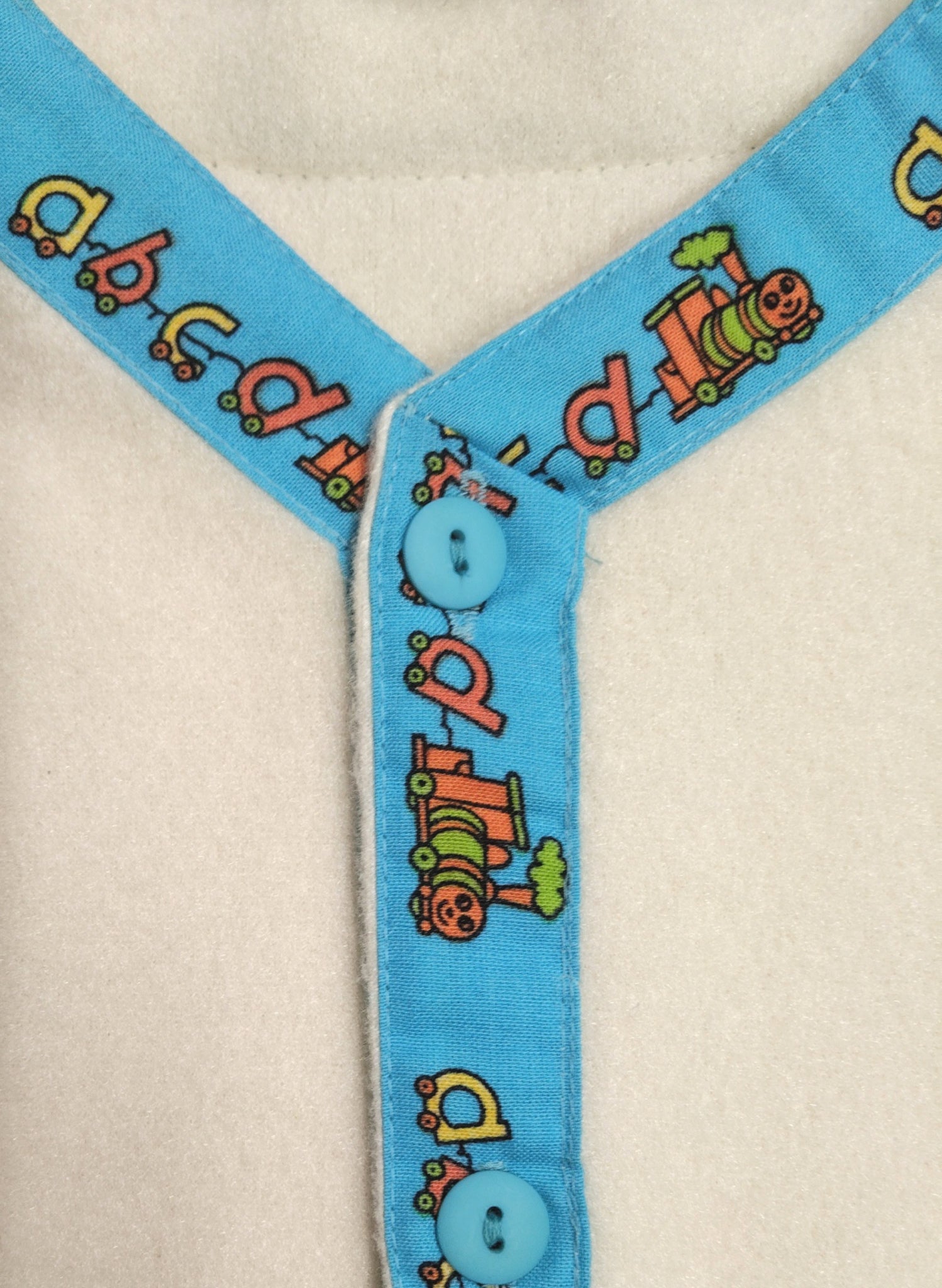 Children's Folk Jacket - Cream Fleece/Turquoise ABC Trim