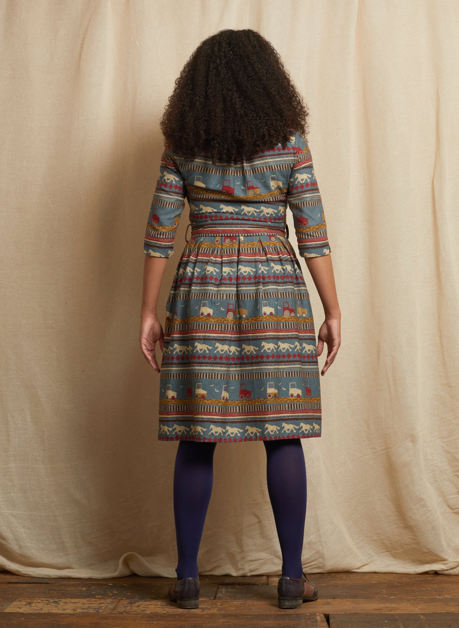 Cynthia - Teal Spinning Horses Dress