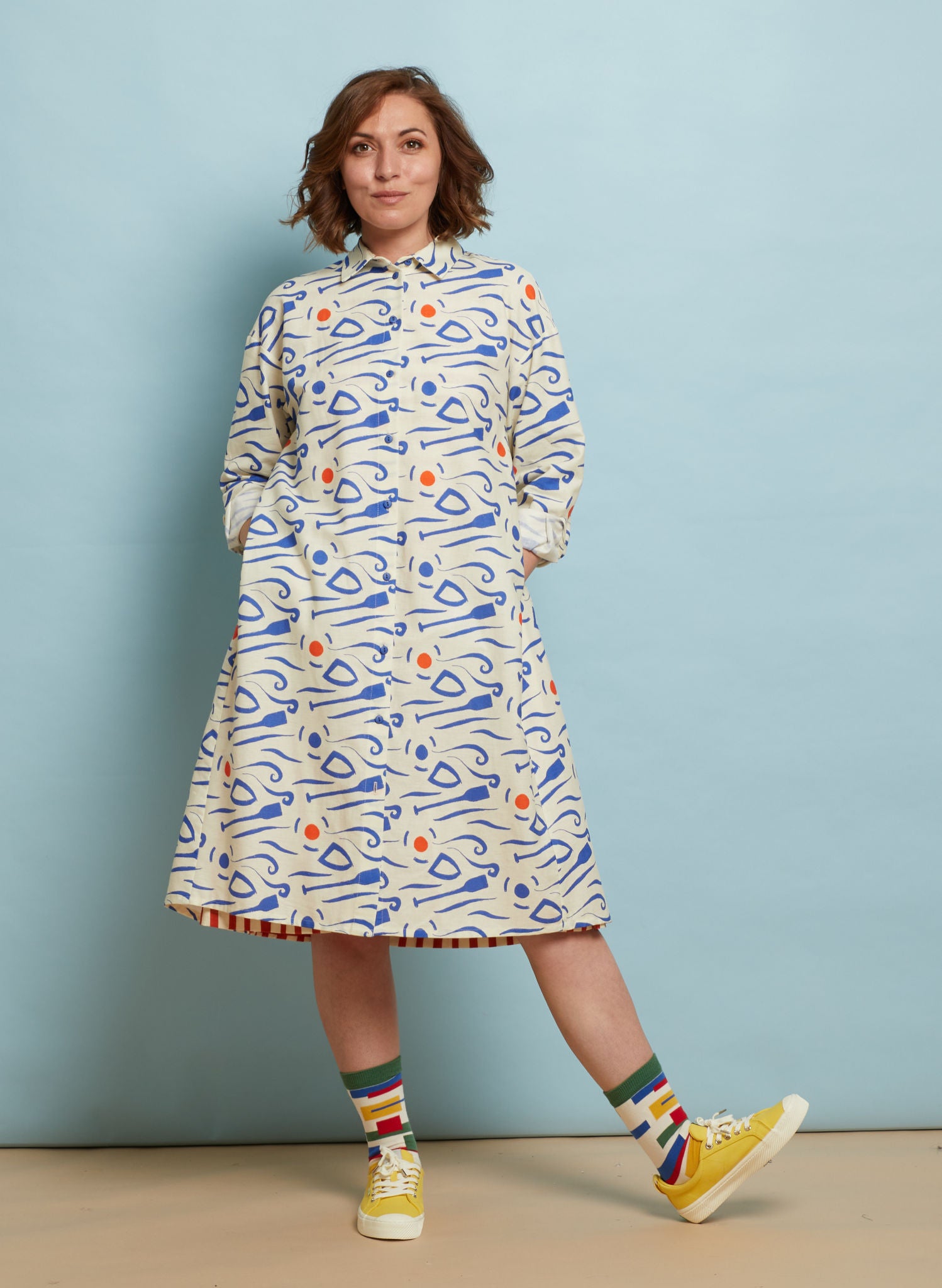 Long sleeve shirtdress bright blue red print on cream white background 