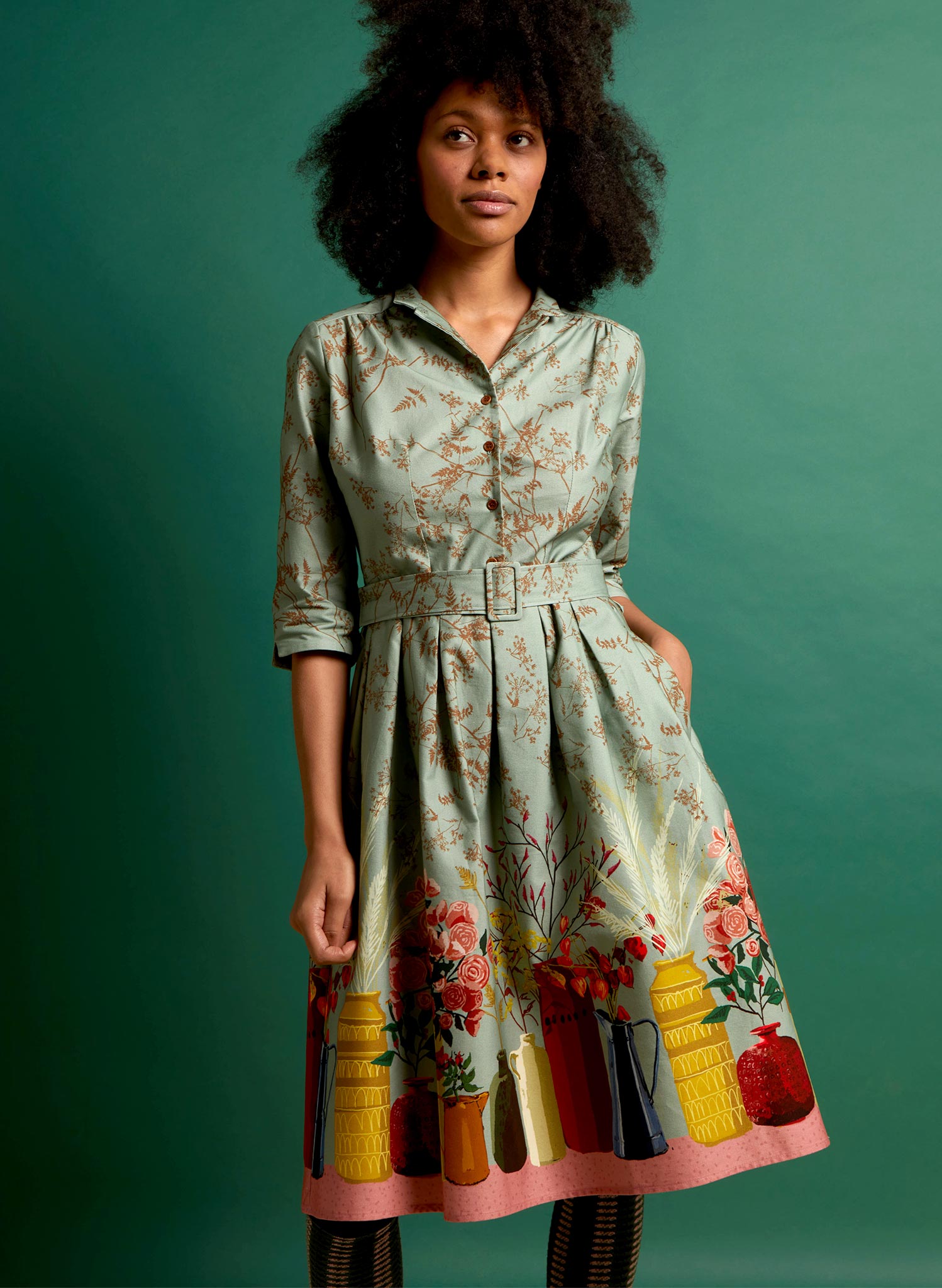 organic cotton, vintage-style, sage knee-length belted shirt dress with 3/4 length sleeves, pockets, and a floral print