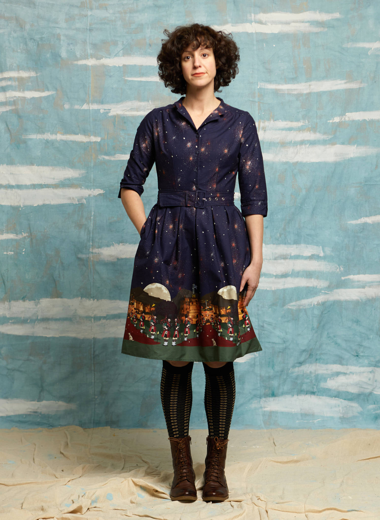 organic cotton sparkly navy knee-length belted shirt dress with 3/4 length sleeves, pockets, and an Edinburgh castle print