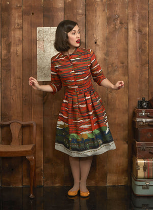 organic cotton, vintage-style, rust knee-length belted shirt dress with 3/4 length sleeves and flying Scotsman steam train print