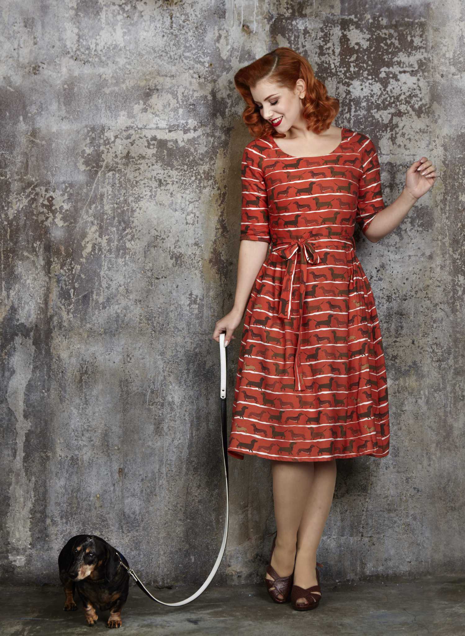 organic cotton, vintage-style, rust knee-length dress with tie-waist belt, pockets, and dachshund dog print