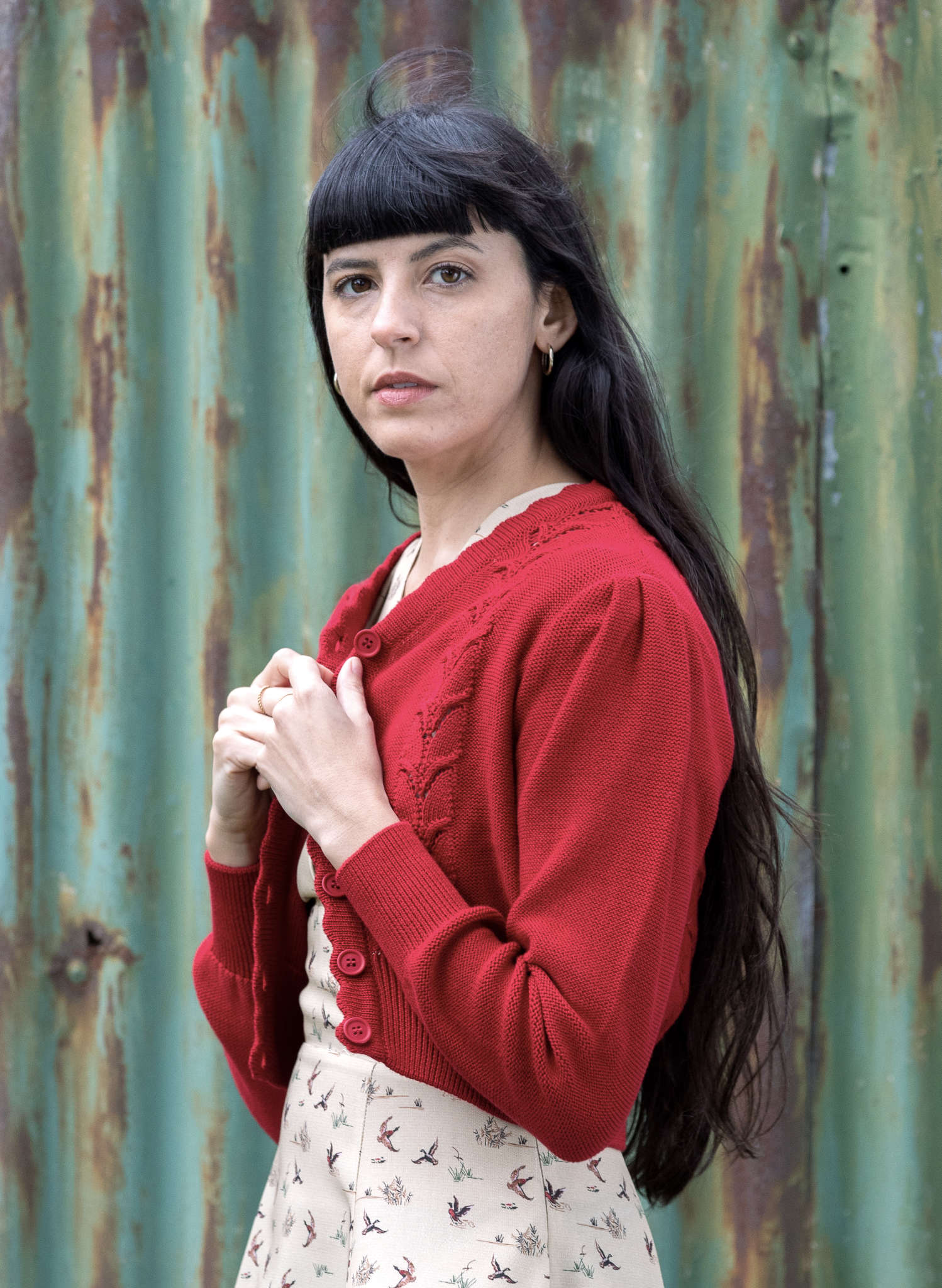 organic cotton, vintage-style, cropped burgundy cardigan with a scalloped vine detail, v-neck, buttons, and long sleeves