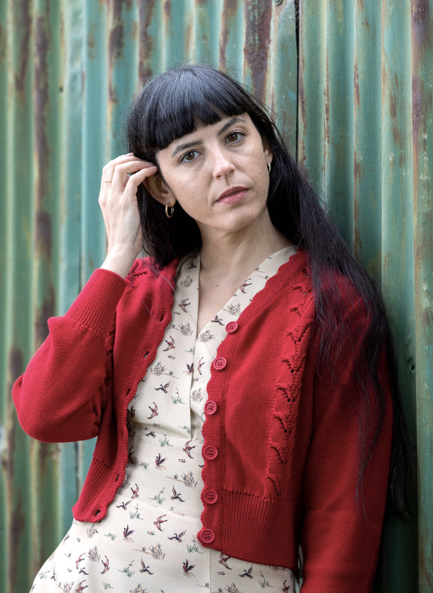 organic cotton, vintage-style, cropped burgundy cardigan with a scalloped vine detail, v-neck, buttons, and long sleeves