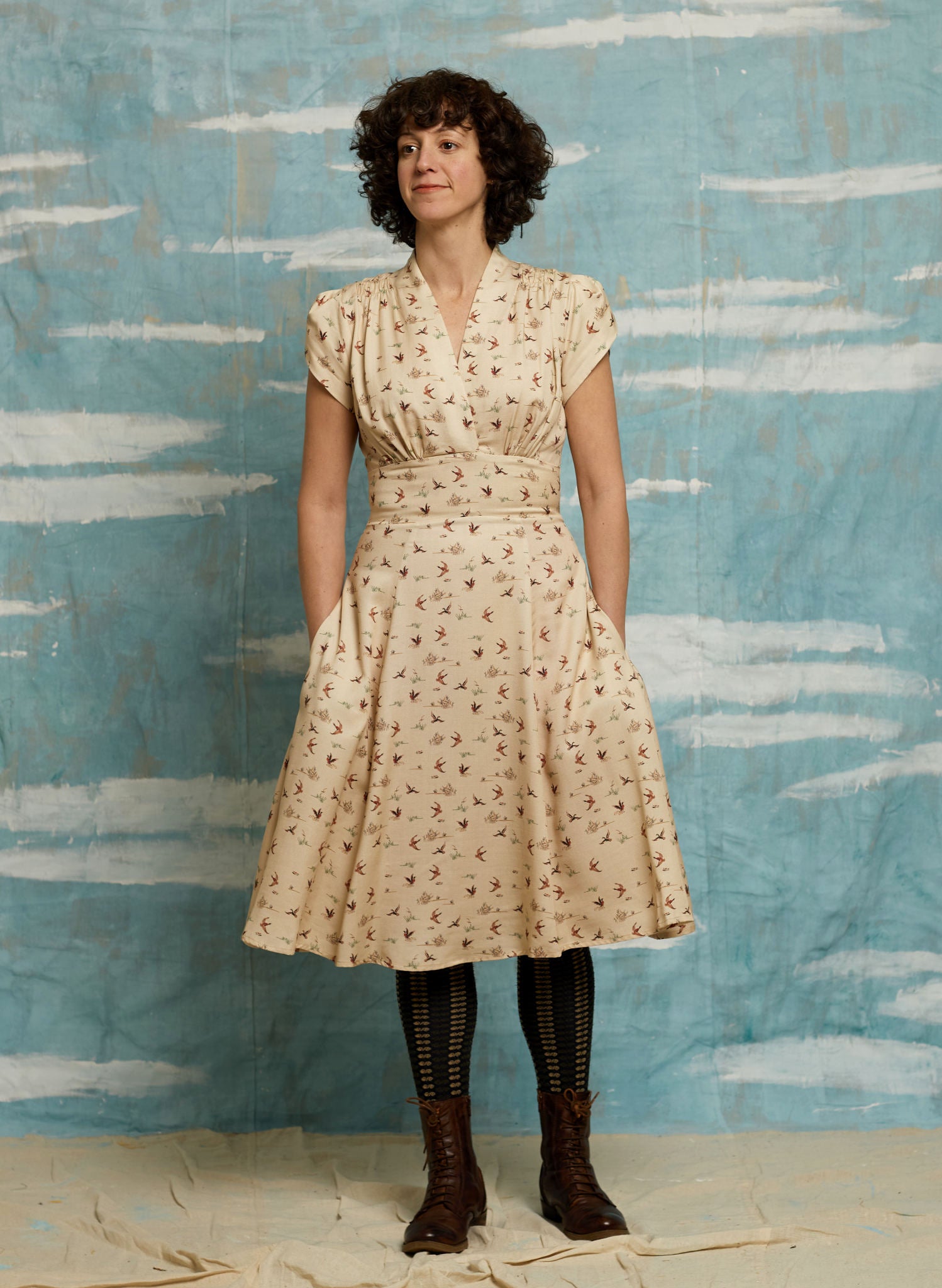 Cap sleeve 1940s style knee length dress with fun print of ducks on cream background