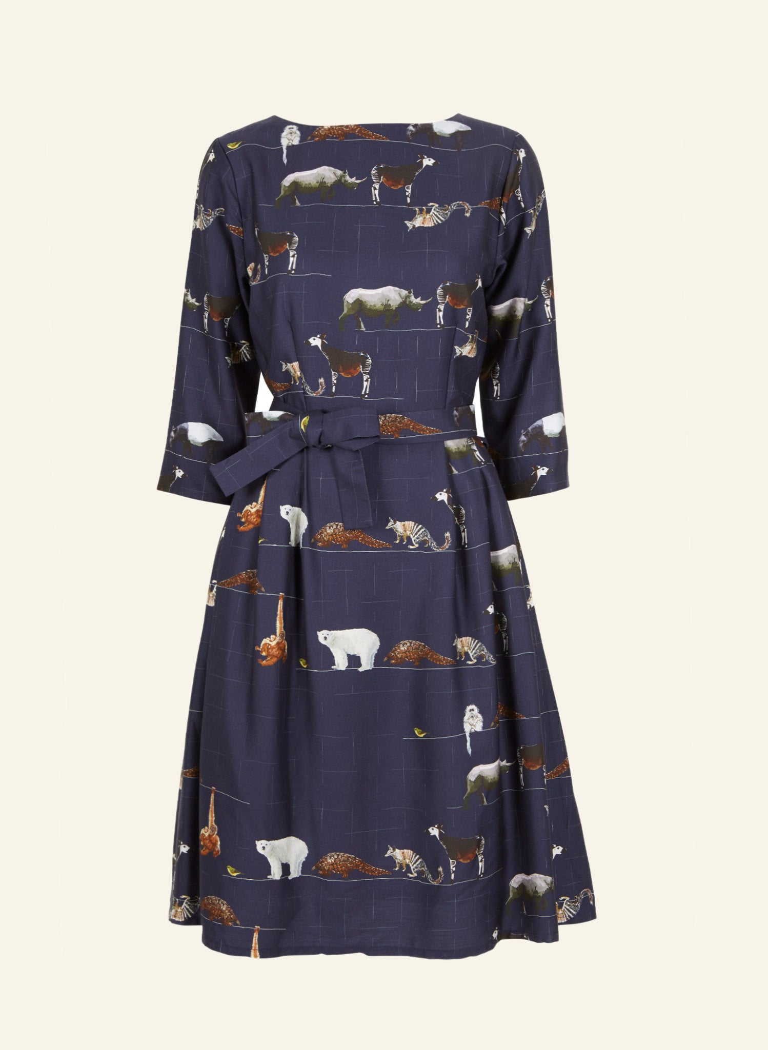 100% Tencel navy midi dress with tie-waist belt, 3/4 length sleeves, and endangered animals print