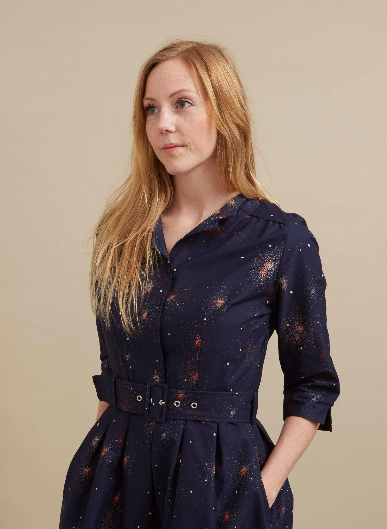 organic cotton sparkly navy knee-length belted shirt dress with 3/4 length sleeves, pockets, and an Edinburgh castle print