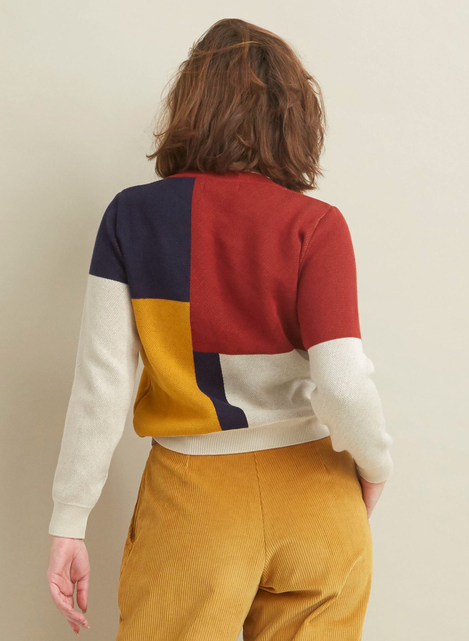 organic cotton red navy mustard and white color block bauhaus print knitted jumper