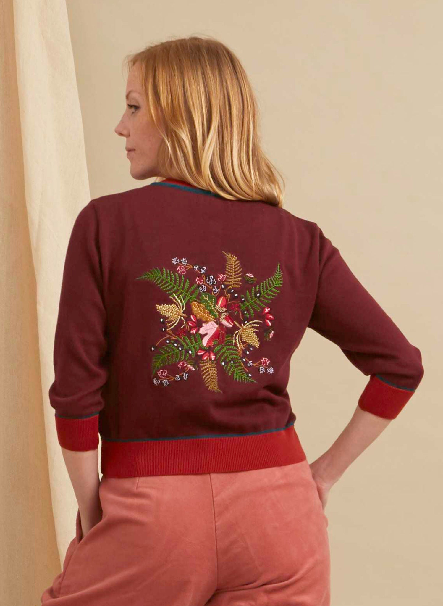 vintage style organic cotton knit cardigan in plum color with embroidered hedgerow in the back