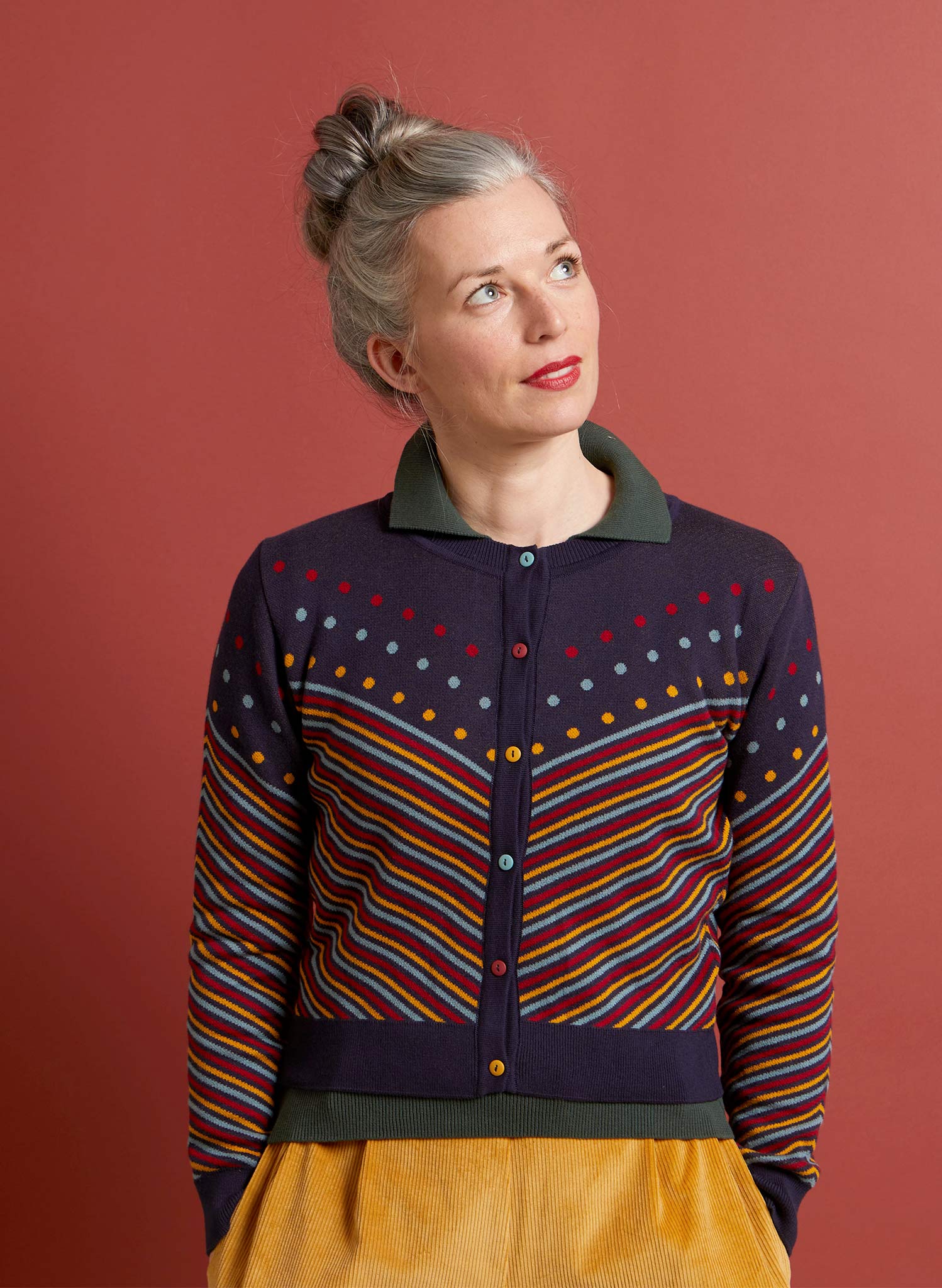 navy organic cotton jacquard knit cardigan with colorful stripes and dots