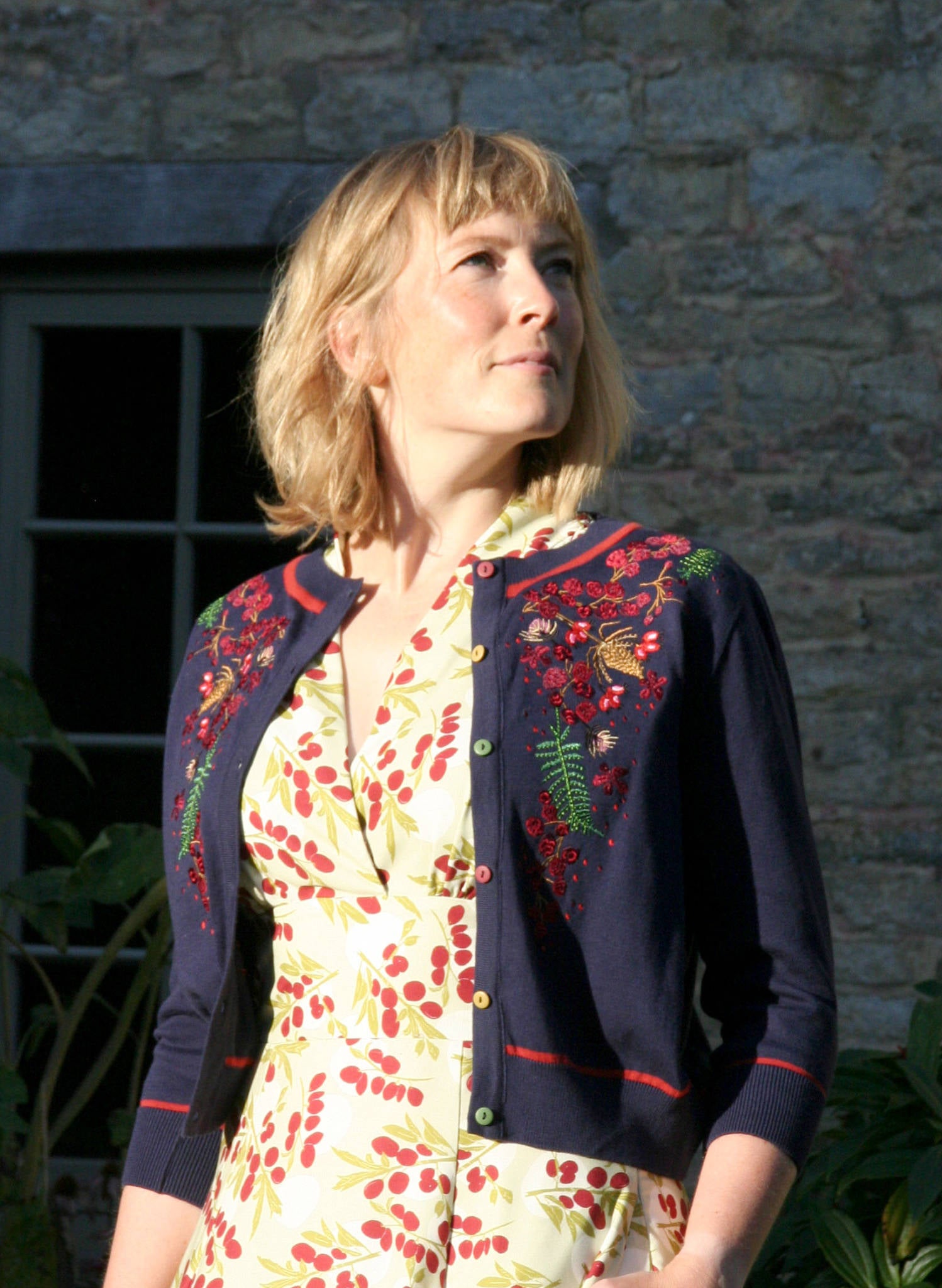 vintage style navy organic cotton knitted cardigan with red floral embroidery