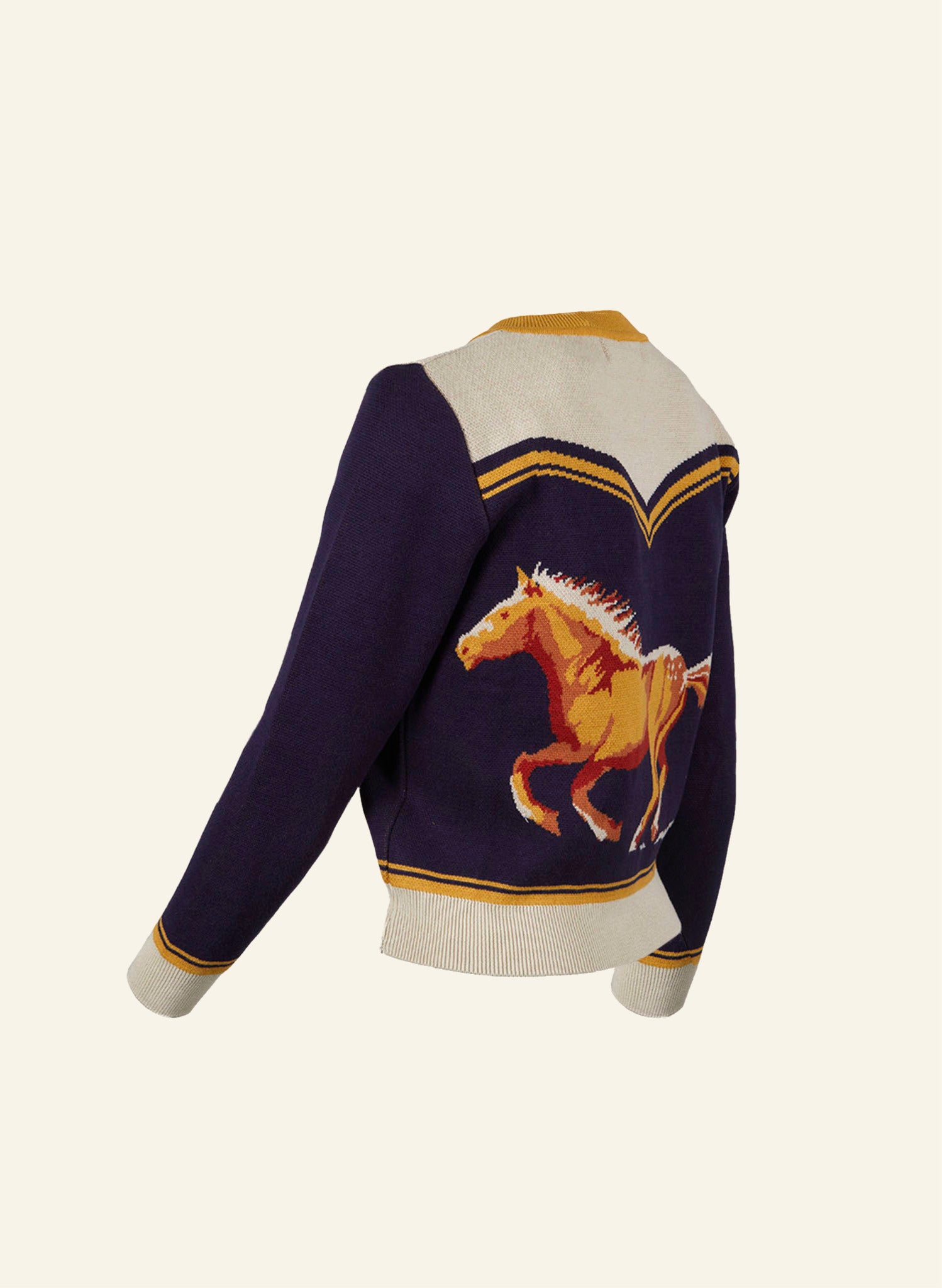 vintage style organic cotton knit cardigan in navy, white, and mustard with horse in the back