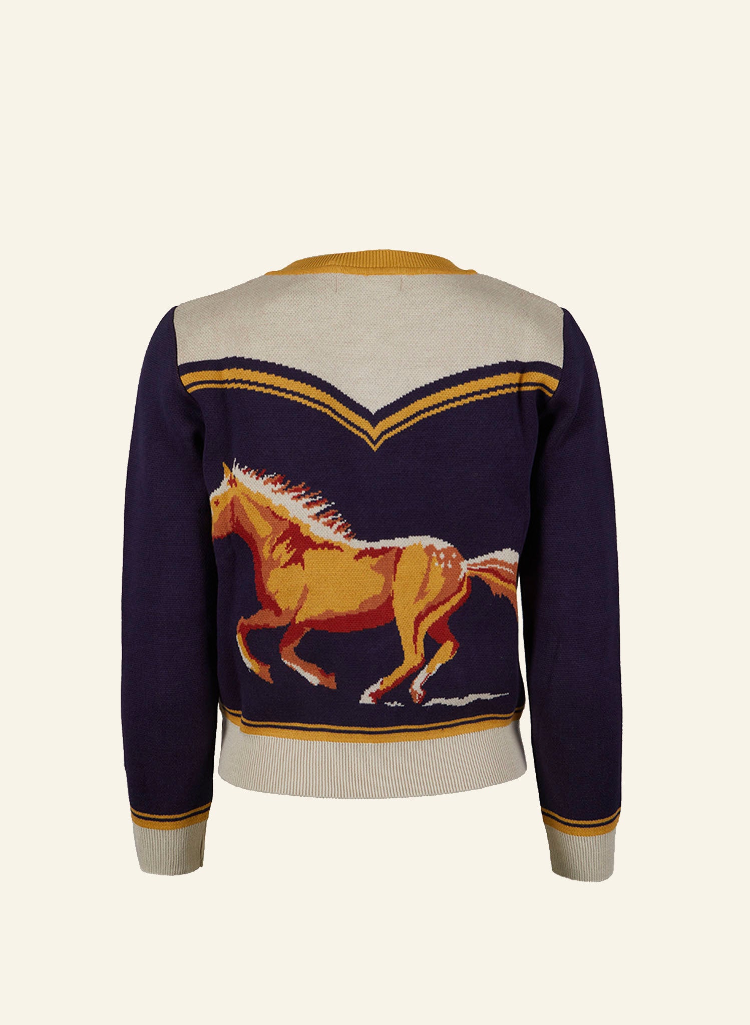 vintage style organic cotton knit cardigan in navy, white, and mustard with horse in the back